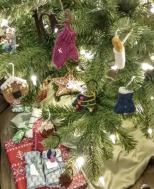 knitted ornaments on a christmas tree